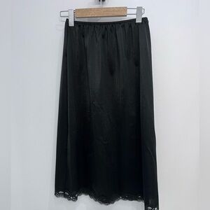 Warner medium black Slip Skirt with Lace Trim.